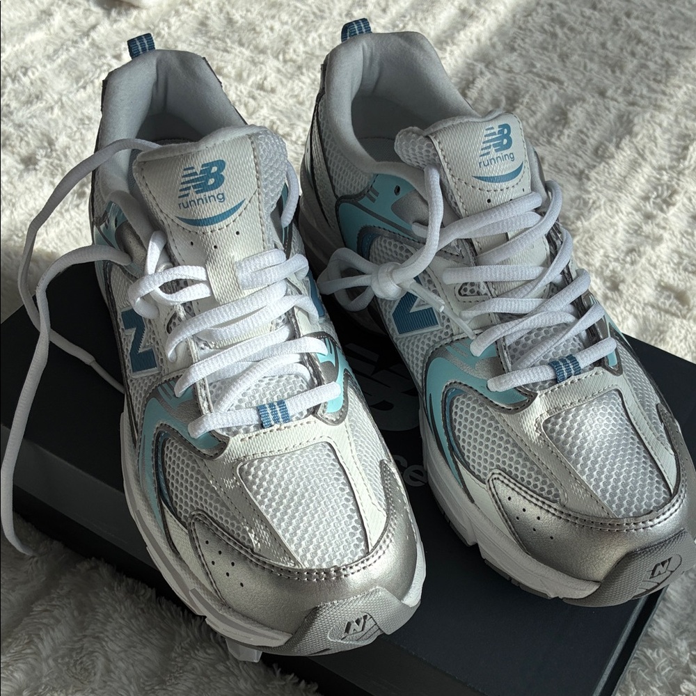 New Balance Silver and Light Blue Sneakers